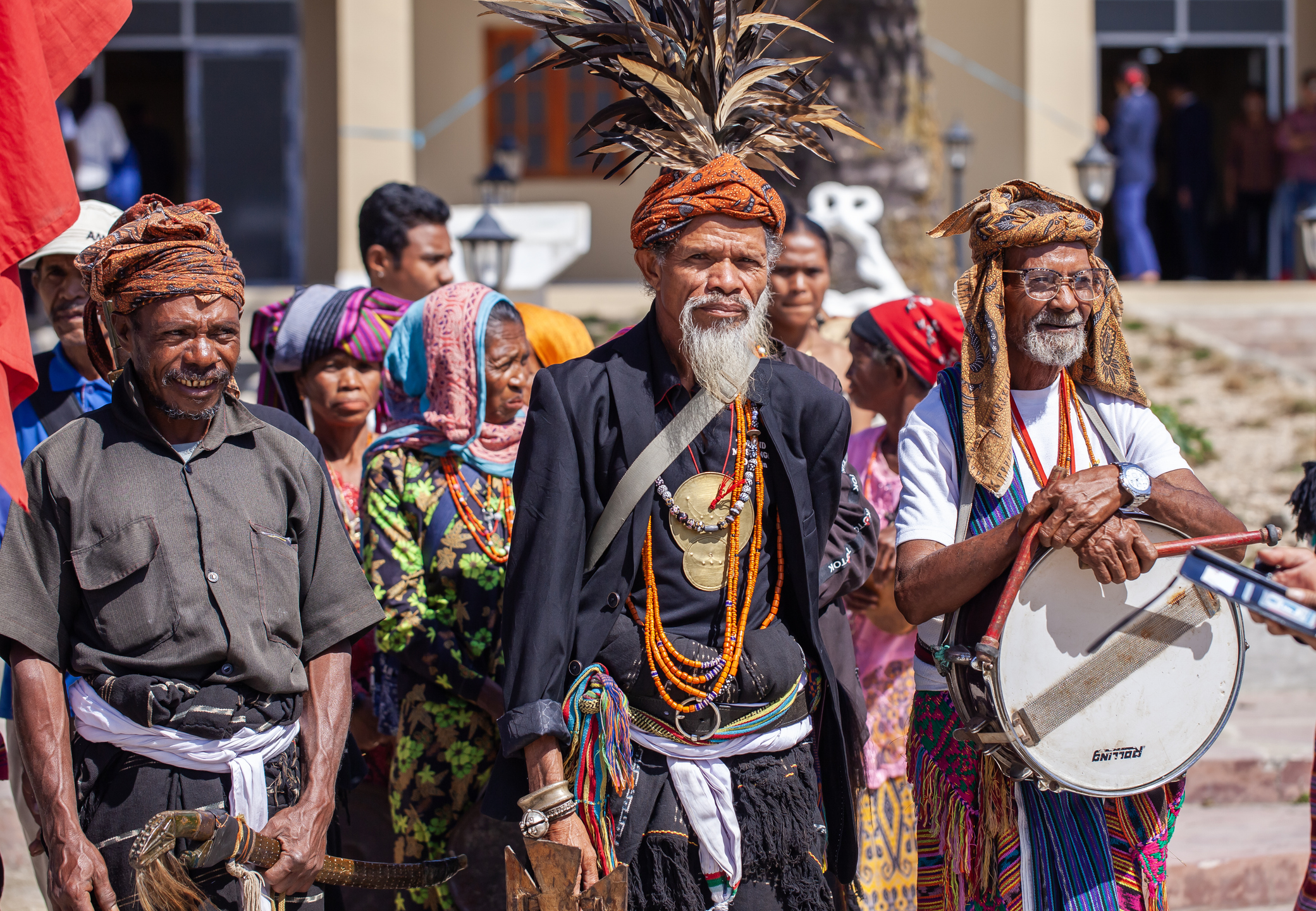 Elderly Local Timorese People In Aileu Regency, Wearing Traditional Clothes And Accessories, Attend An Official Event Organized By The Local Government