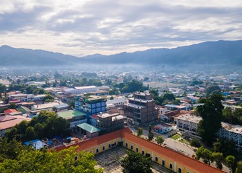 One Part Of Dili City Seen From The Height, Residential And Business Area. Dili City Is The Capital Of Timor Leste. Located On The Coast And Surrounded By Hills